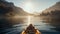 a kayak sails on the water at sunset in a mountainous area