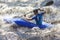 Kayak slalom canoe race in white water rapid river, process of kayaking competition with colorful canoe kayak boat paddling,