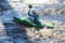 Kayak slalom canoe race in white water rapid river, process of kayaking competition with colorful canoe kayak boat paddling,