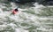 A kayaker braving the rapids on the Snake River near Jackson, Wyoming.