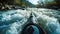 Kayaker experiences adrenaline rush as they navigate a white-water rapid on the river