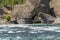 A kayaker paddles along the Spokane River at the Bowl and Pitcher area of Riverside State Park in Spokane, Washington, USA