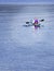 Kayaker paddling on lake