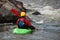 Kayaker is ready to training on a rough water.