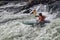 Kayaker in whitewater