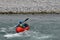 Kayaker on whitewater in Rhine Gorge Ruinaulta in Switzerland.