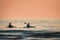 Kayakers on Lake Michigan at sunset in South Haven Michigan