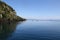 Kayakers on Lake Taupo, New Zealand near Mine Bay Maori rock carvings