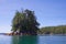 Kayakers observe a very large eagle`s nest on an island in Raymond Passage, British Columbia