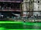 Kayakers paddle along the Chicago River, which is dyed green for St. Patrick`s day, gathering attention