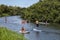 Kayakers paddleboarders Hanalei River Kauai Hawaii