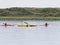 Kayakers paddling near nature reserve Het Oerd on West Frisian island Ameland in Waddensea, Friesland, Netherlands