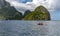 Kayaking around majestic cliffs on the El Nido island