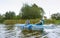 Kayaking on a calm river, young people rafting on the river