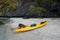 Kayaking with camping supplies on the beach at archipelago island