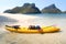 Kayaking with camping supplies on the beach at archipelago island