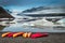 Kayaking on a cold lake near a blue glacier, Iceland