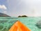 kayaking in crystal clear tropical waters - kayak heading to isolated beach in Ko Tarutao national park