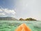 kayaking in crystal clear tropical waters - kayak heading to isolated beach in Ko Tarutao national park