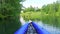 Kayaking through forest lake