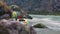 kayaking group paddling in wild water river Steyr near Hinterstoder