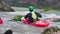 kayaking group paddling in wild water river Steyr near Hinterstoder