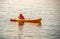 Kayaking lessons. Boy with  life buoy suit in kayak lessons during summer vacations in an island of Greece.