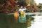 Kayaking on the river. Adult caucasian bearded man floating at the kayak. Copy space. The concept of the World Tourism