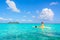 Kayaking in tropical paradise - Canoe floating on transparent turquoise water, caribbean sea, Belize, Cayes islands