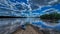 Kayaks along a sandbar near Spring Green on the Wisconsin river with clouds reflecting in the water