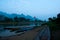 Kayaks on Nam Song River at Sunrise in Vang Vieng