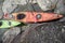 Kayaks stand moored on a rocky seashore. Top view.