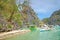 Kayangan lake limestone rock formation and boats in Coron, Palawan, Philippines