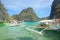 Kayangan lake limestone rock formation and boats in Coron, Palawan, Philippines