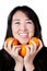 Kazakh Girl with tree oranges