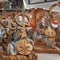 Kazakh national handmade musical instruments with horsehair strings are sold on a street stall on a sunny day.