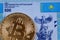 A Kazakhstan 500 tenge bank note with a golden bitcoin