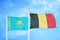Kazakhstan and Belgium two flags on flagpoles and blue sky