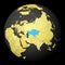 Kazakhstan on dark globe with yellow world map.