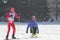 KAZAN, RUSSIA - MARCH, 2018: The skier and disabled skier on ski-track on city competitions cross-country skiing