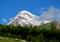 Kazbek mountain covered with snow in Caucasian mountains in Georgia