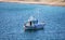 Kea, Tzia, Greece. Traditional fishing boat, trawler moored at Otzias cove