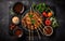 Kebabs - grilled meat skewers, shish kebab with vegetables on black wooden background.