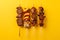 Kebabs tasty fast food street food for take away on yellow background