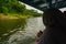 Kebumen, Central Java, Indonesia (12/30/2018) : A woman is riding a boat around the Sempor Dam