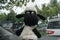 KEBUMEN, INDONESIA â€“ AUGUST 2, 2021: A shaun the sheep doll who is sitting and relaxing