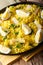 Kedgeree, traditional scottish meal with rice, fish and eggs, vertical