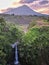 Kedung kayang waterfall and Merapi mountain view. Sunrise with forest scenery. Magelang, Indonesia