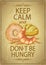 Keep calm and don`t be hungry quote card with baked goods