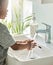 Keep clean, stay healthy. Closeup shot of an unrecognisable boy washing his hands at a tap in a bathroom at home.